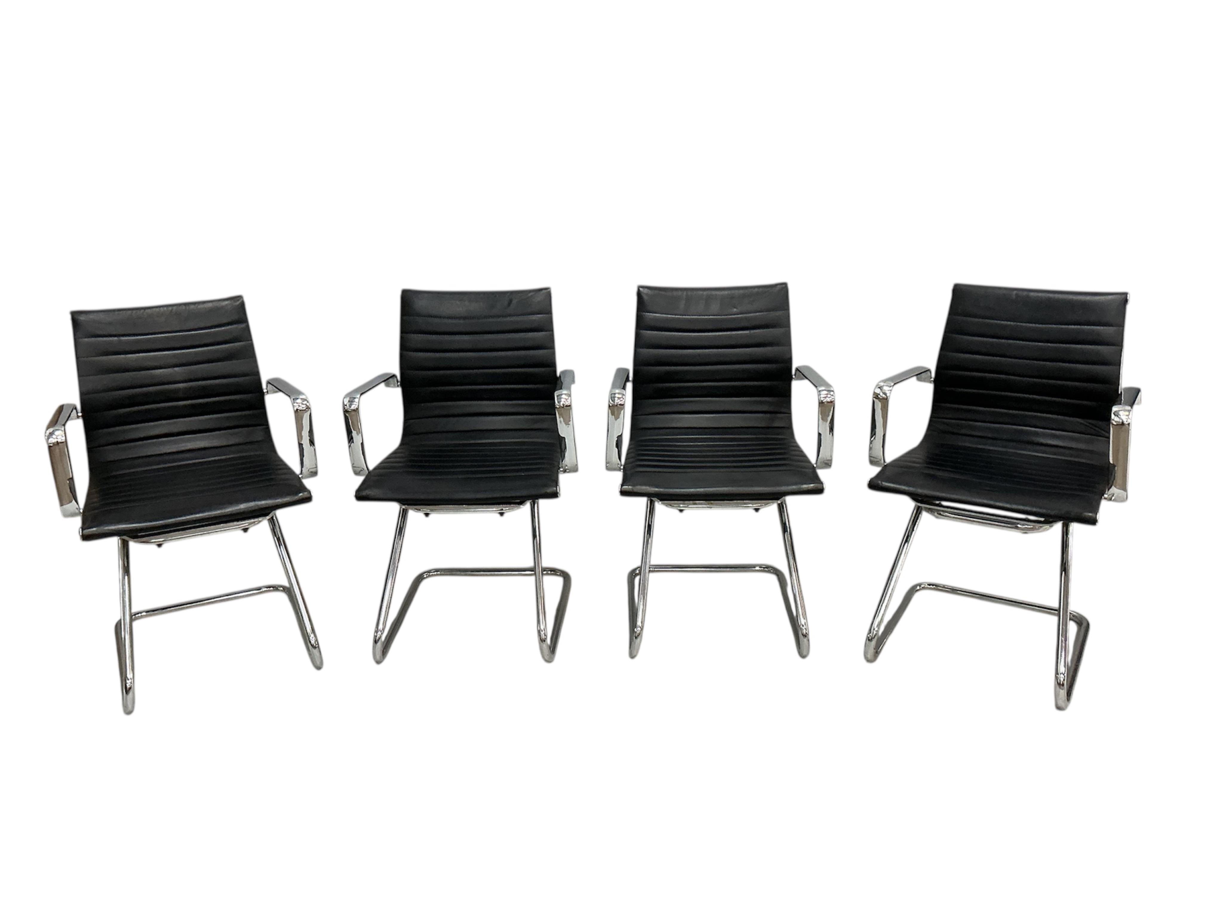 A set of seven Aria chrome chairs, width 57cm, depth 56cm, height 87cm